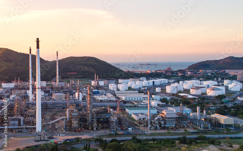 Oil refinery with a background of the city.The factory is located in the middle of nature and no emissions. The area around the air pure.business logistic.Aerial view .Top view.