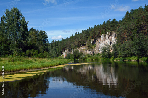 Cliff "St. George Rock" on the shore of Chusovaya river, Sverdlovsk Region, Russia.