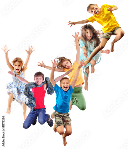 group of happy cheerful sportive children jumping and dancing