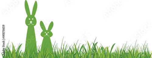 2 grüne Osterhasen im Gras