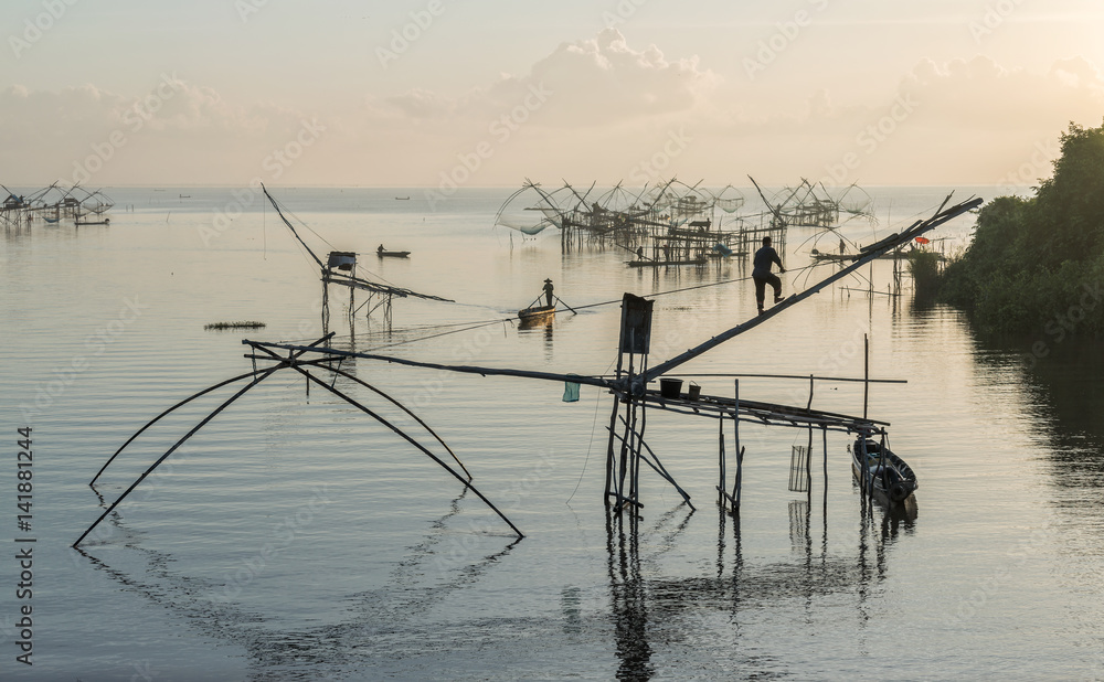 Morning scene and square dip net fishing gear at Pakpra village, Phatthalung, Thailand. Morning scene and square dip net fishing gear at Pakpra village, Phatthalung, Thailand.