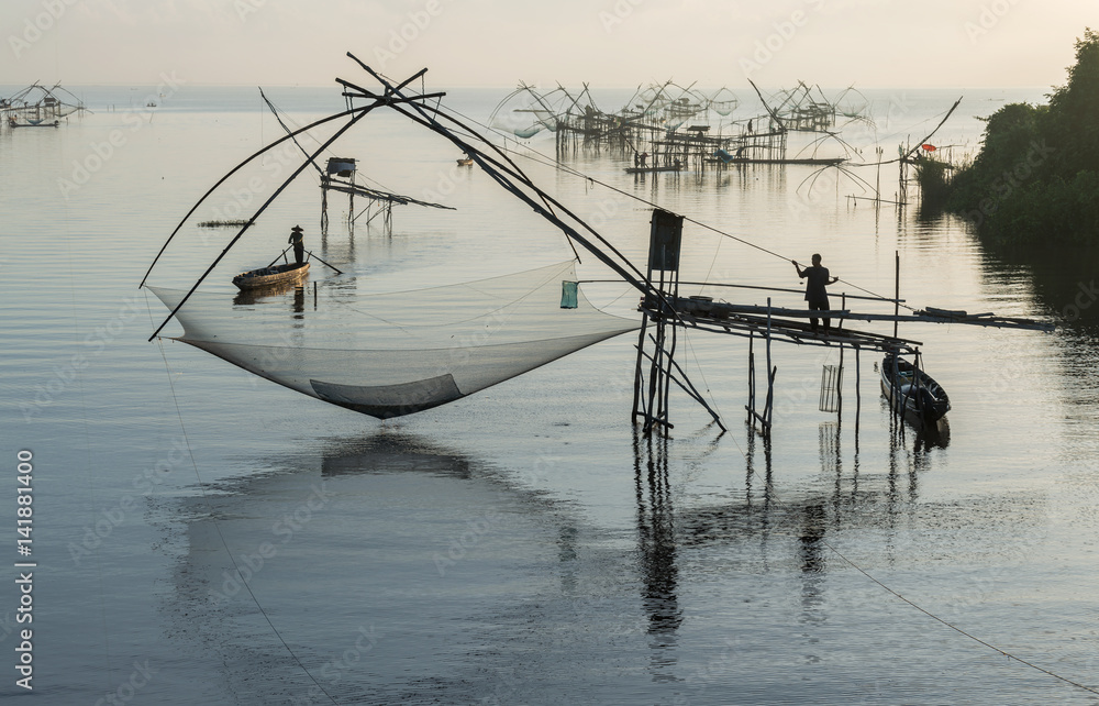 Morning scene and square dip net fishing gear at Pakpra village,  Phatthalung, Thailand. Stock Photo
