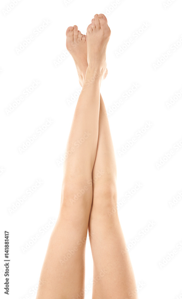 Beautiful female legs on white background Beautiful female legs on white background