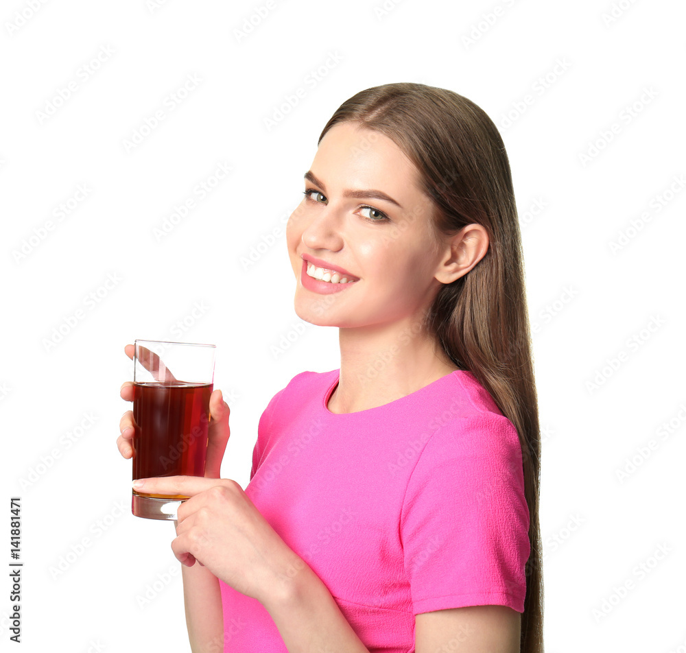 Beautiful young woman with glass of fresh juice on light background Beautiful young woman with glass of fresh juice on light background