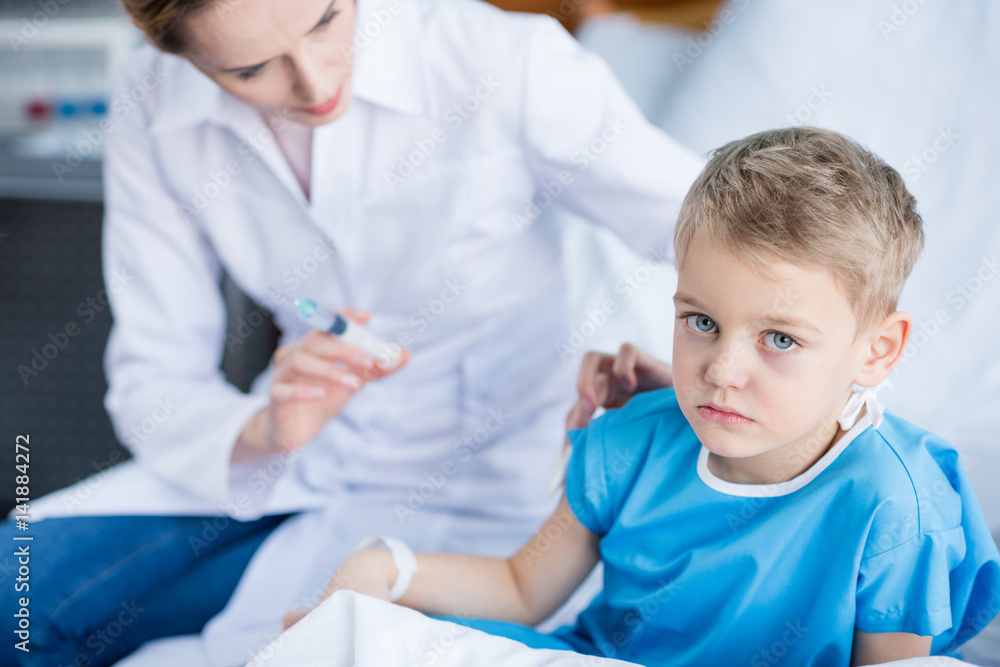 Doctor making injection Doctor making injection