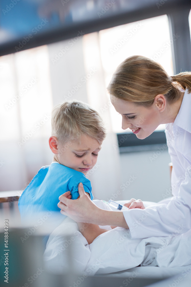 Doctor making injection Doctor making injection