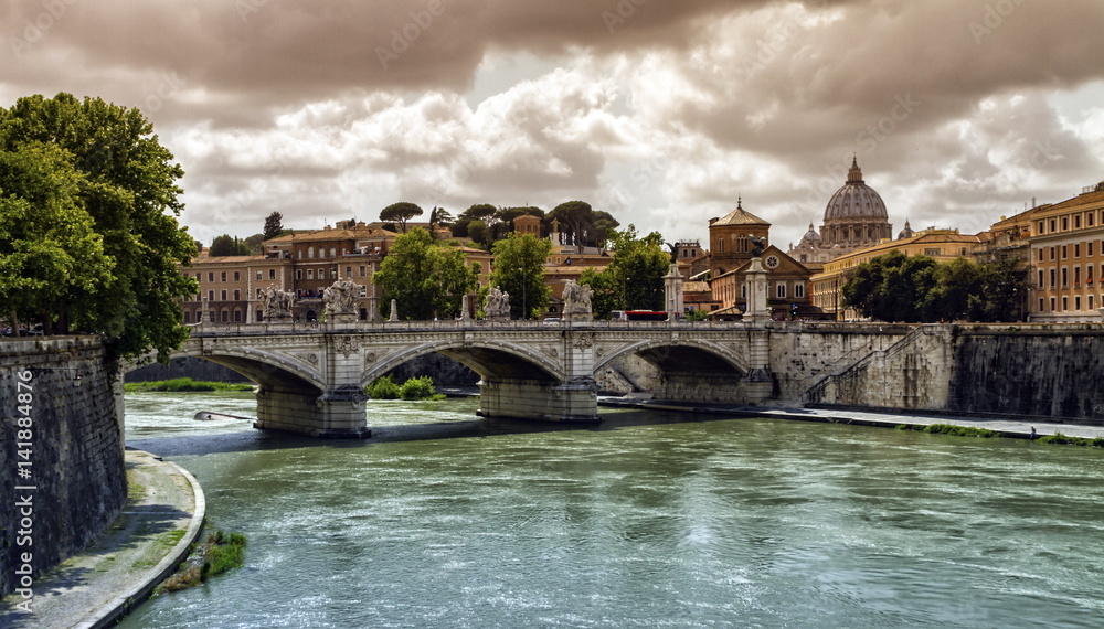 Tiber river, Ponte Sant'Angelo and St. Peter's cathedral, Roma, Italy