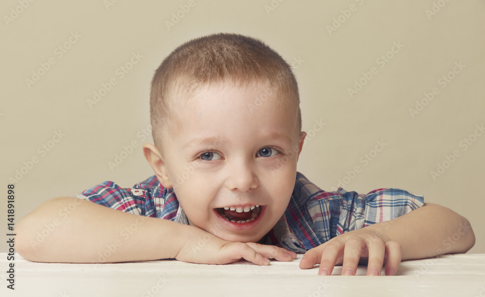 Portrait of a cool exiting boy 4 years on a light background Portrait of a cool exiting boy 4 years on a light background