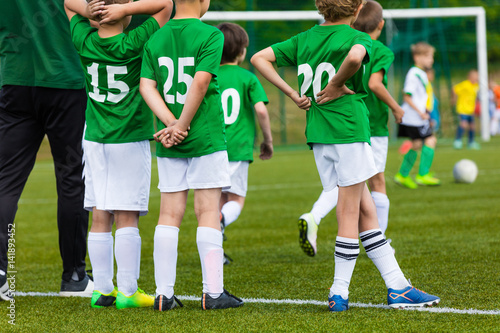 Youth Soccer Team; Reserve Players on a Bench; Boys Ready To Play European Football Match
