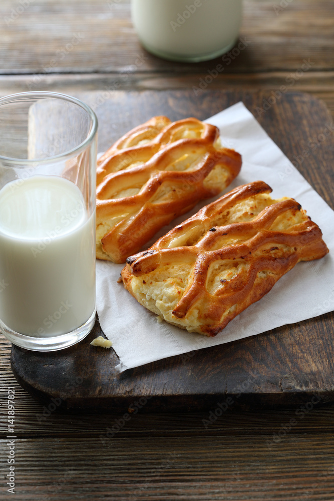 Glass of milk with buns