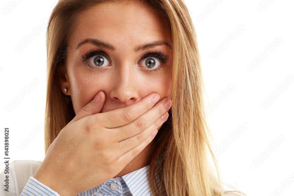 Afraid woman looking at camera isolated on a white background Afraid woman looking at camera isolated on a white background