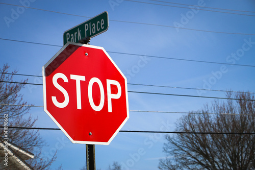 Stop Sign Against Sky On Park Place Street