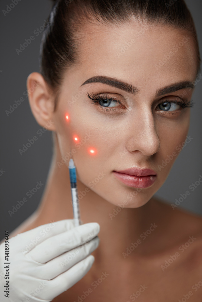 Obraz premium Beautiful Woman Receiving Facial Skin Lift Injections