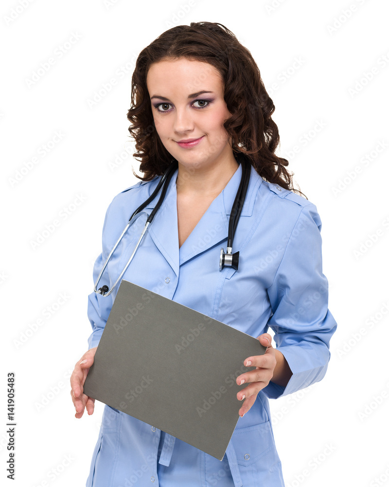 Young woman doctor showing empty blank clipboard