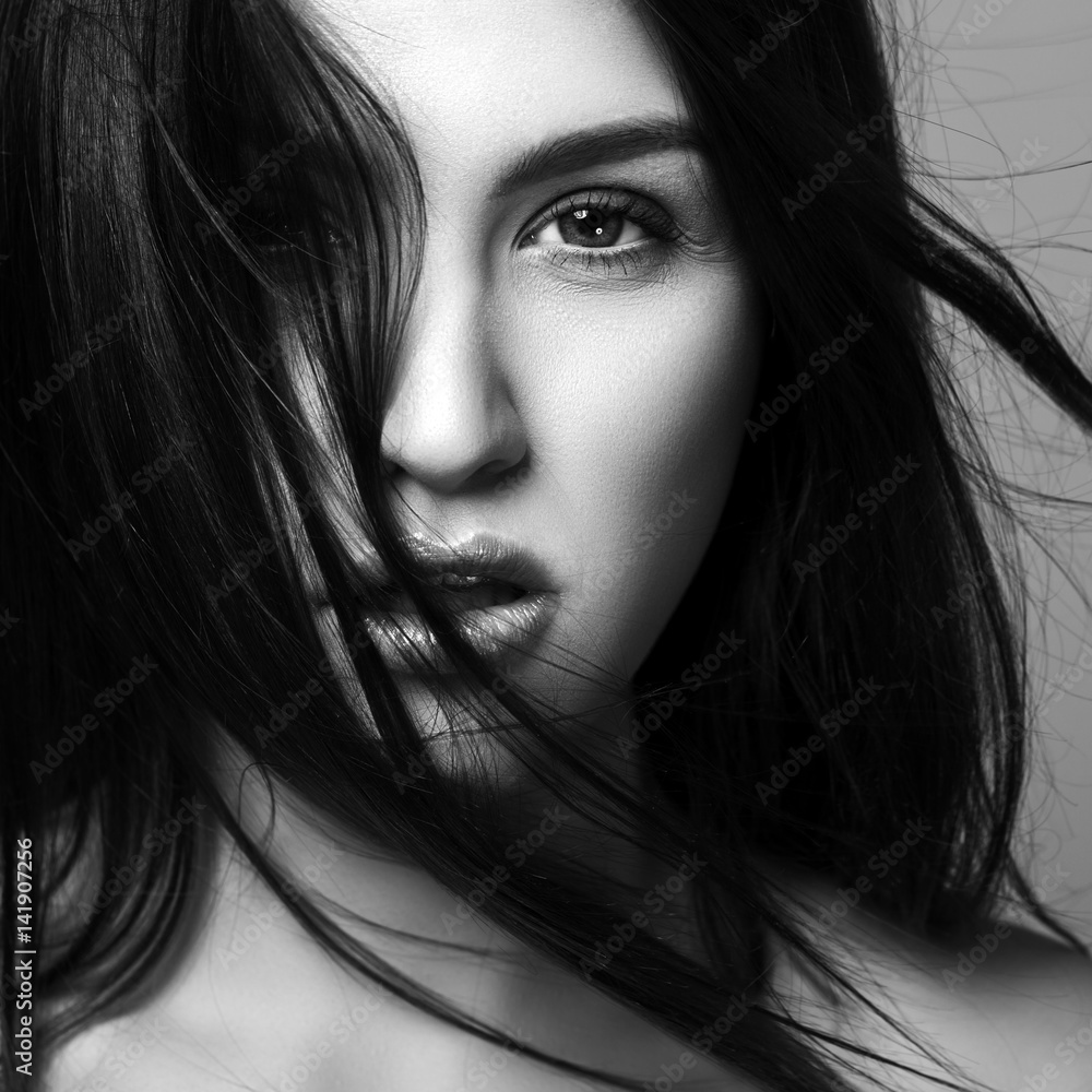 Fototapeta premium Black and white portrait of a beautiful woman