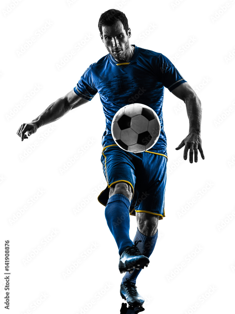 Naklejka premium one caucasian soccer player man playing in silhouette isolated on white background