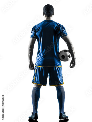 one caucasian soccer player man standing Rear View in silhouette isolated on white background © snaptitude