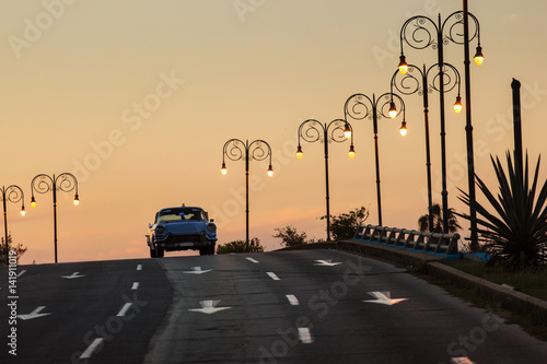 Photography Old car on street of Havana at sunset, Cuba