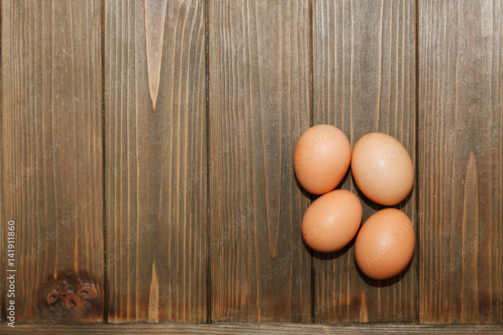 Eggs on a wooden background Eggs on a wooden background