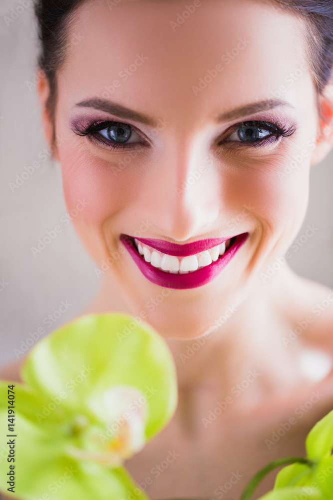 Beautiful face of woman with makeup and sincere smile Beautiful face of woman with makeup and sincere smile