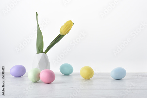Easter eggs with yellow tulip