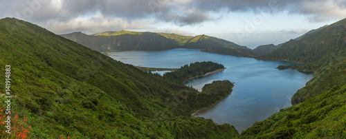 Wide panorama of scenic Lagoa do Fogo in late afternoon  Sao Miguel  Azores  Portugal