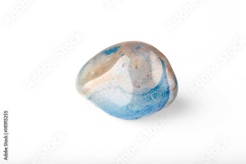 Polished blue agate stone on a white background.
