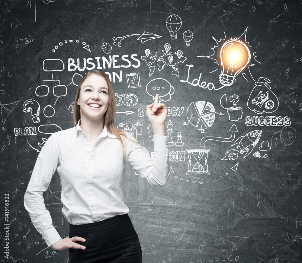 Positive woman and a business plan Positive woman and a business plan