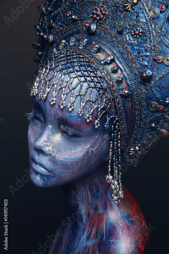 Mannequin in silver head wear © EVGENY FREEONE