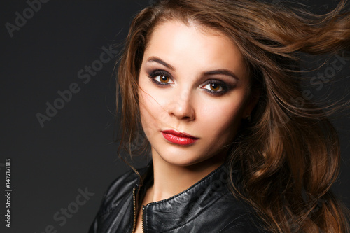 Wallpaper Mural Portrait of beautiful brunette female wearing leather jacket Torontodigital.ca