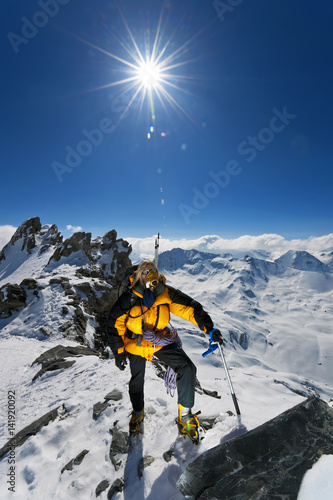 Tablou pe pânză A mountaineer using oxygen at high altitude.