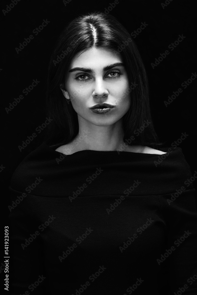 Beautiful woman portrait on ebony background monochrome Beautiful woman portrait on ebony background monochrome