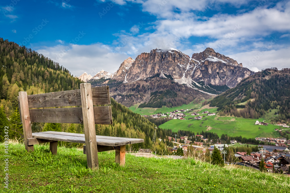 Small wooden bench in Dolomites, Alps, Italy, Europe