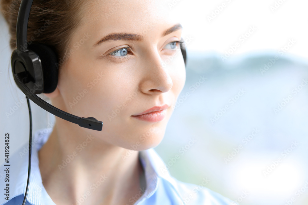 Call center operator. Portrait of beautiful business woman in headset. Call center operator. Portrait of beautiful business woman in headset.