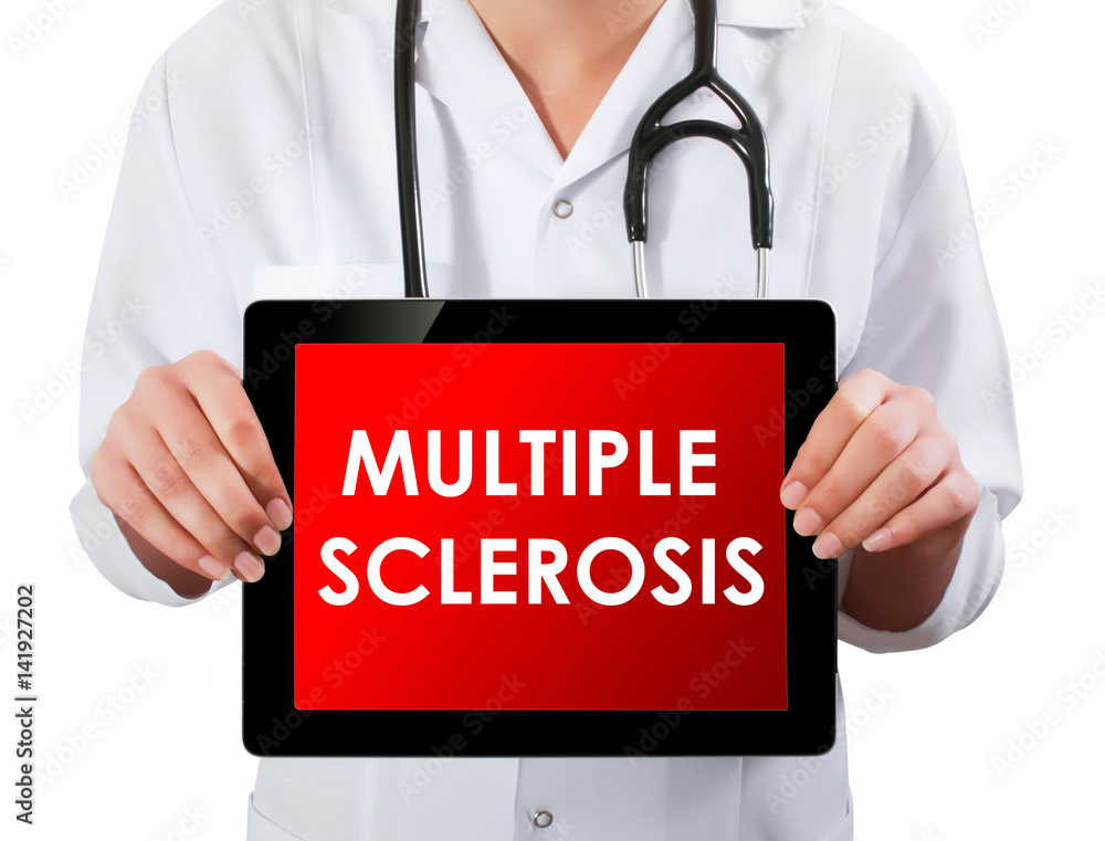 Doctor showing digital tablet screen.Multiple sclerosis Doctor showing digital tablet screen.Multiple sclerosis