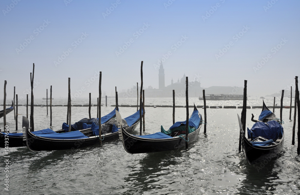 Gondolas in Canal Grande with San Giorgio maggiore island