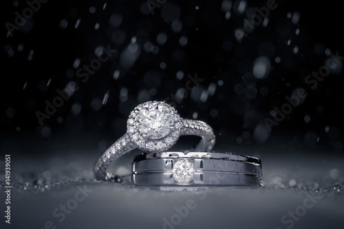 wedding engagement diamond rings with water drops photo