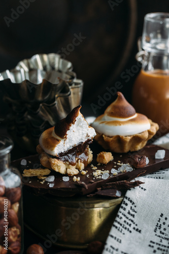 Chocolate Tartlets with nuts and Italian meringue