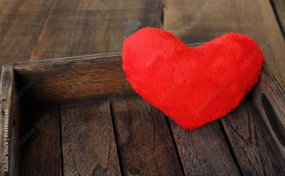 Naklejka premium Heart on wood in love.