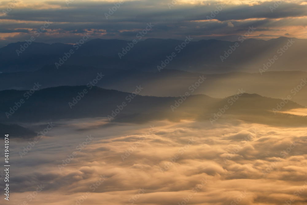 Layer of mountains in the mist at sunrise time, Sri Nan National Park, Nan Province, Thailand