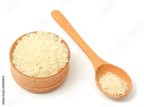 rice on wood plate isolated on white background