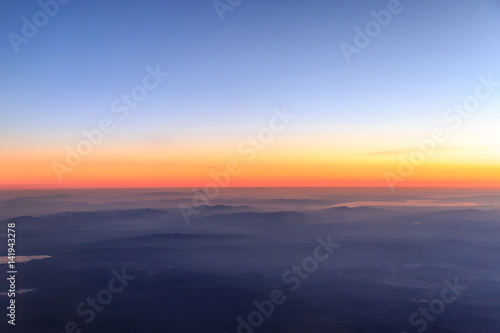 View of Aegean region of turkey from sky with mist on mountains