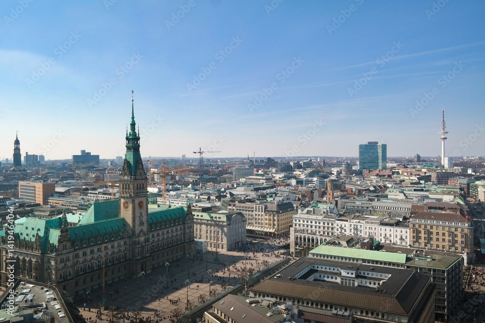 aerial view over Hamburg cityscape with townhall, Michel and Heinrich-Hertz-Turm Telemichel under blue sky