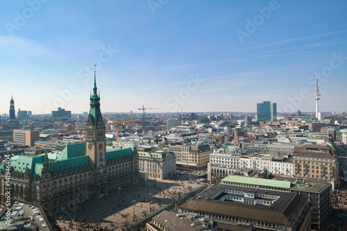 aerial view over Hamburg cityscape with townhall, Michel and Heinrich-Hertz-Turm Telemichel under blue sky