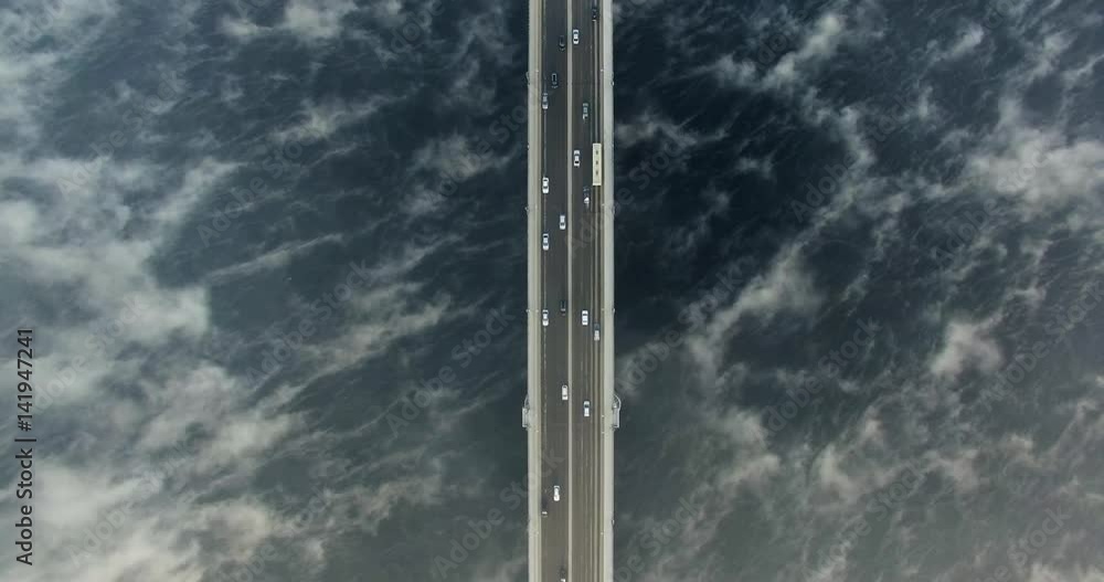 Amazing urban landscape. View of the bridge in the fog top down. Nadir. Aerial View. Amazing urban landscape. View of the bridge in the fog top down. Nadir. Aerial View.