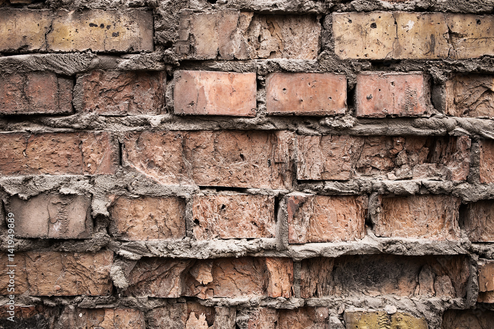 Industrial background, empty grunge urban street with warehouse brick wall Industrial background, empty grunge urban street with warehouse brick wall