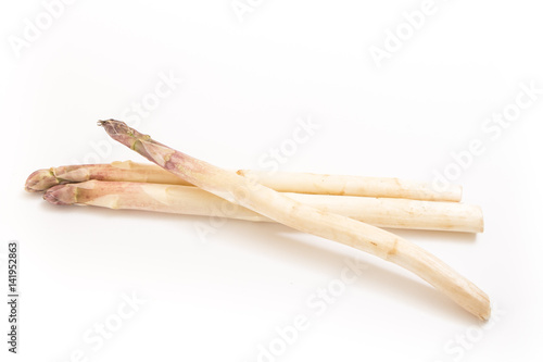 Three white asparagus spears, on white background