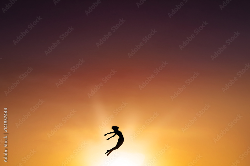 Excited woman jumping on the air