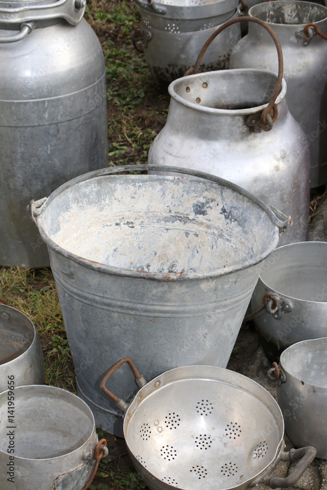 old buckets and other containers in aluminum old buckets and other containers in aluminum