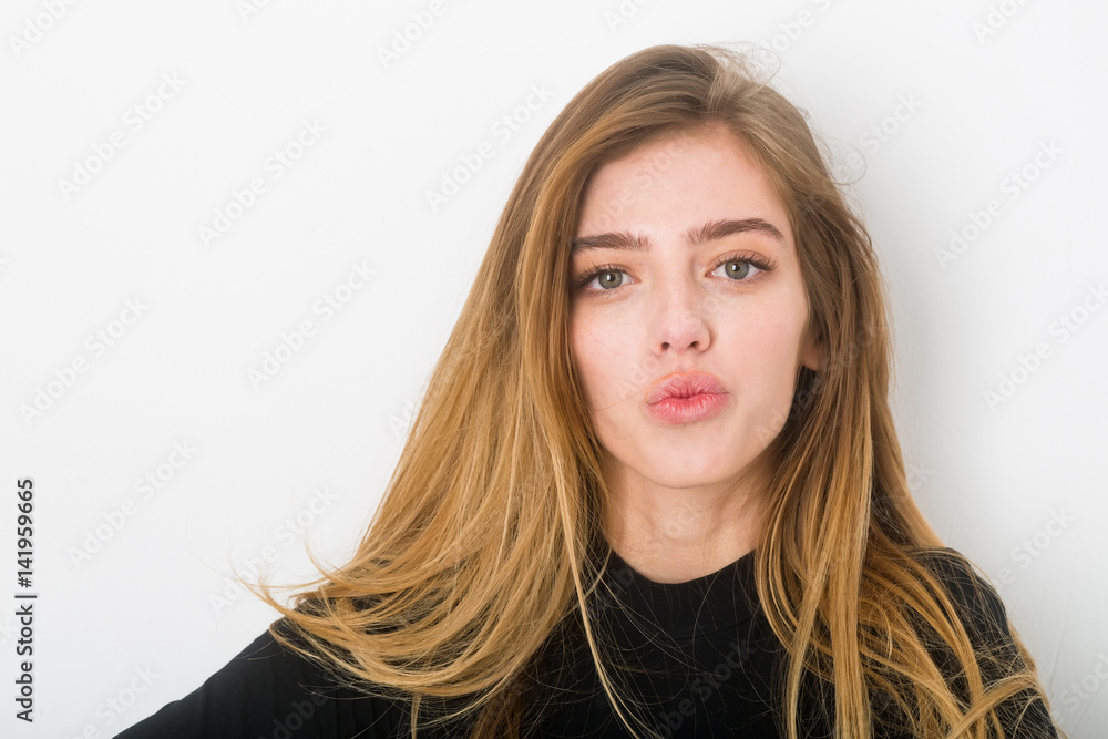 Naklejka premium sexy pretty smiling girl with long blond hair in black
